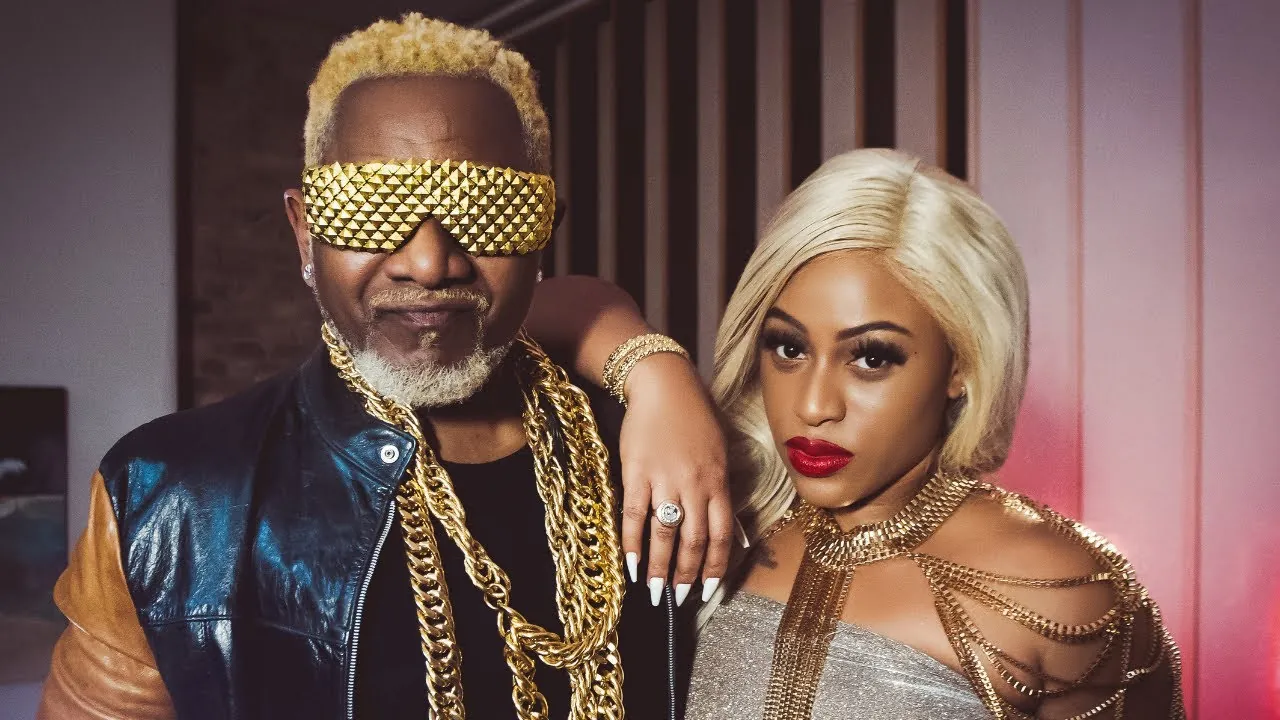 Still from Fiesta, Official Video, with Awilo Longomba